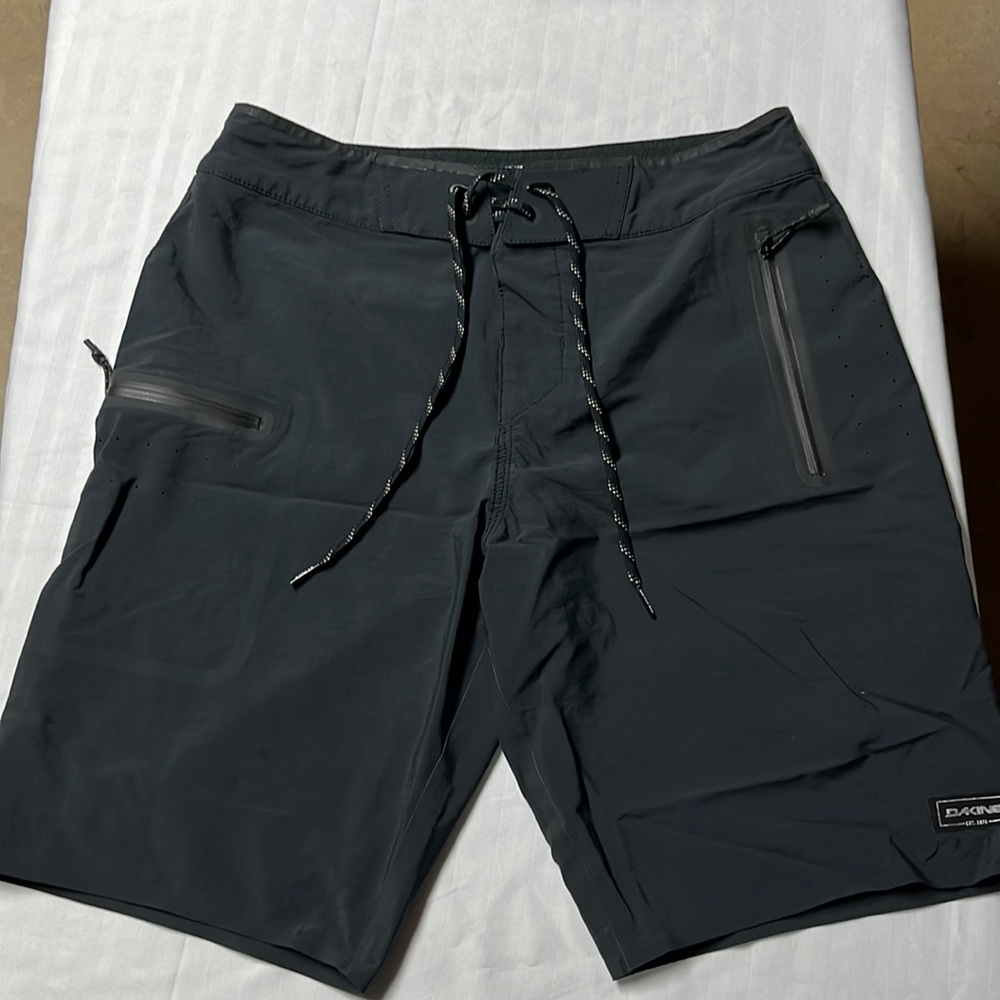 Men’s Dakine board shorts, no tag, size 28.